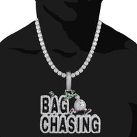 Two-Tone Silver Bag Chasing Dollar Bills Pendant